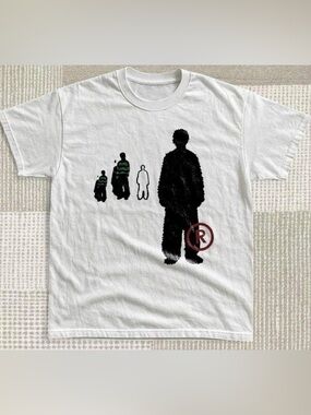 White Tee with Black Silhouette and Green Accent